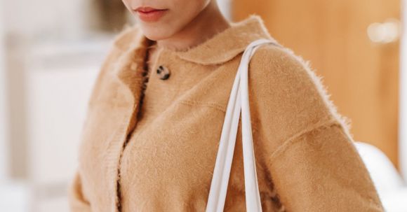 Sustainable Clothes - Young ethnic woman with cloth shopping bag