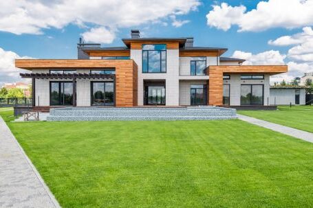 Neighborhood - Exterior of modern house with glass doors and panoramic windows