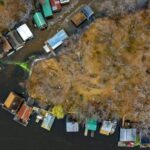 Neighborhood - Aerial Photography of Island Near Body of Water