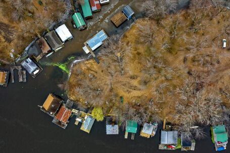 Neighborhood - Aerial Photography of Island Near Body of Water