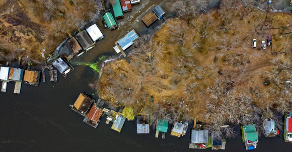 Neighborhood - Aerial Photography of Island Near Body of Water