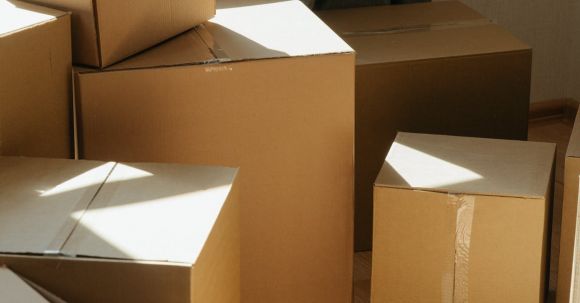 New Home - Brown Cardboard Boxes on White Ceramic Tiles