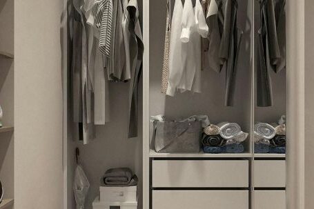 Closet - Assorted Clothes Hanged Inside Cabinet