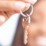 New Home - Person Holding a Key