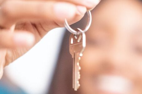 New Home - Person Holding a Key