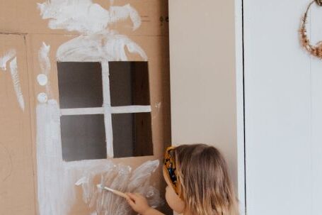 Room Renovation - Girl Painting Cardboard House