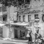 Neighborhood - Grayscale Photo Of People Walking