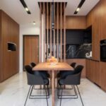 Luxury Properties - Stylish kitchen with wooden furniture and dining zone