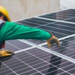 Innovative Sustainability - Solar Technician Installing Solar Panel