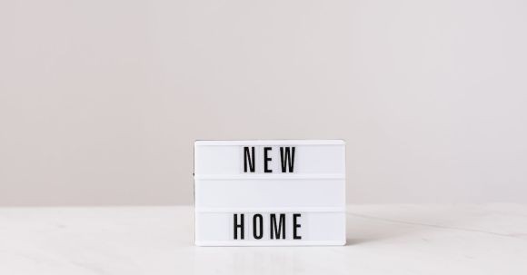 New Home - Light box with new home inscription