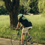 Cycle - Man in Black T-shirt Riding a Bicycle