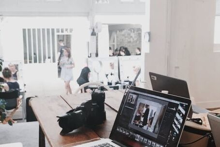 Office - Turned-on Gray Laptop Computer on Table