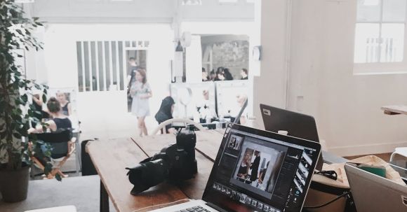 Office - Turned-on Gray Laptop Computer on Table