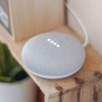 Smart Home - Round Grey Speaker On Brown Board