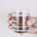 Water - Person Holding Drinking Glass