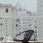 Neighborhood - Modern chair on balcony of modern building