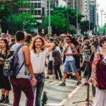 Neighborhood - Crowd of People on Street
