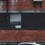 Contemporary Architecture - White Toyota 86 Sports Car Parked in a Residential Building Yard