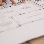New Home - People Looking at Lay Outs