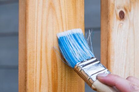 Painting Wall - Person Holding Paintbrush
