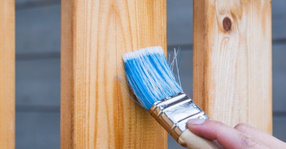 Painting Wall - Person Holding Paintbrush