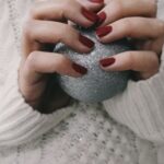 Holiday Season - Person Holding Gray Ball