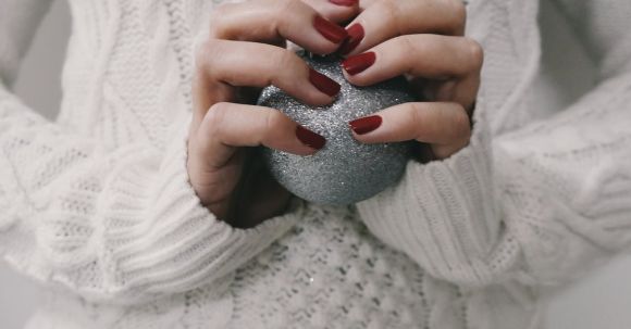 Holiday Season - Person Holding Gray Ball