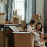 New Home - Family Unpacking After Moving