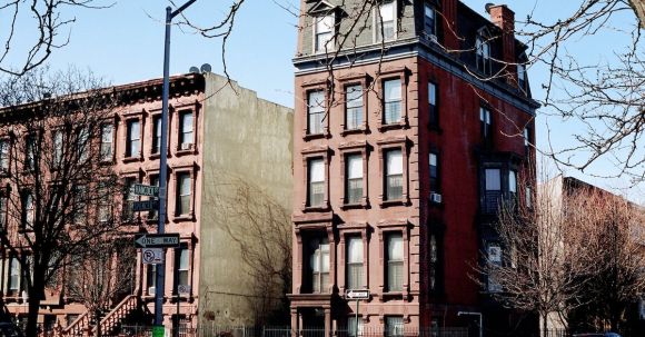Neighborhood - Brown Concrete Structure Under Sunny Sky