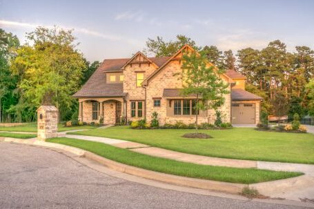 Home Exterior - Brown Brick House Beside Trees