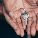 New Home - Key on a Person's Palm