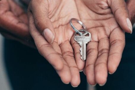 New Home - Key on a Person's Palm