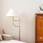 Luxury Properties - Cozy room with armchair and cabinet